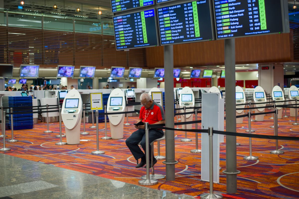 Airline check-in kiosks in an airport terminal