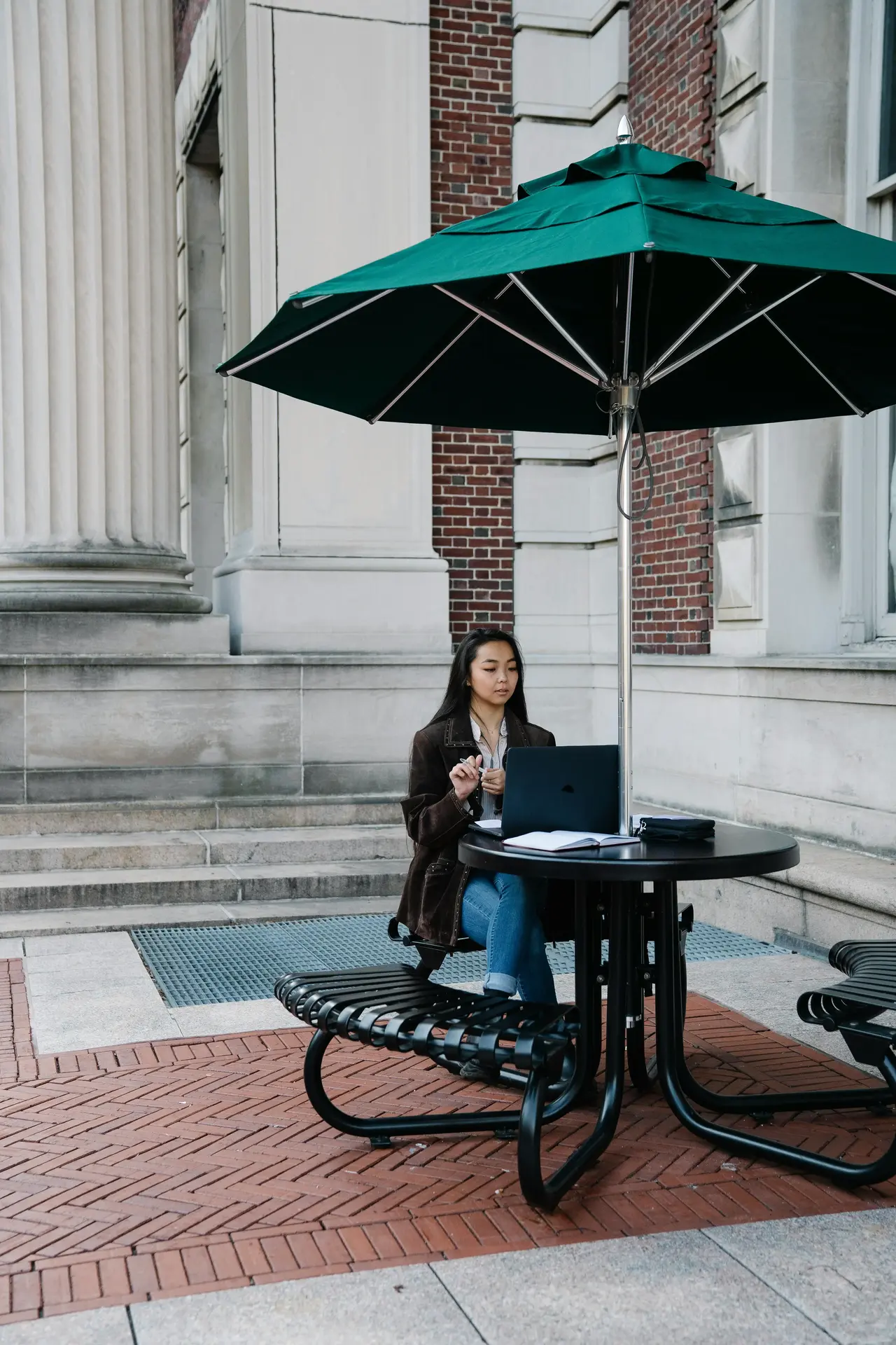 Traveler under umbrella